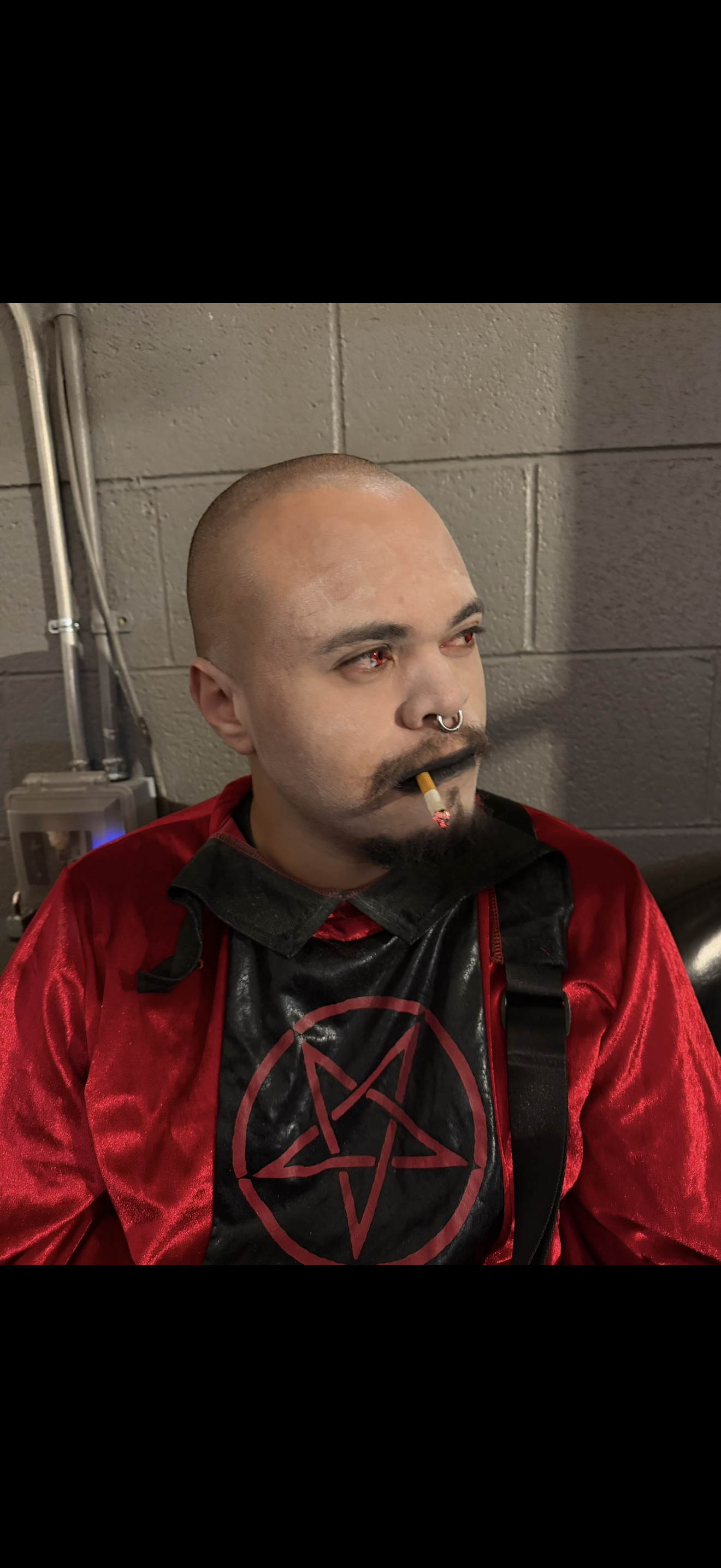 ihateyou! in red robe costume, cigarette in mouth.